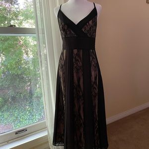 Black lace spaghetti strap dress. Nude lining size 12